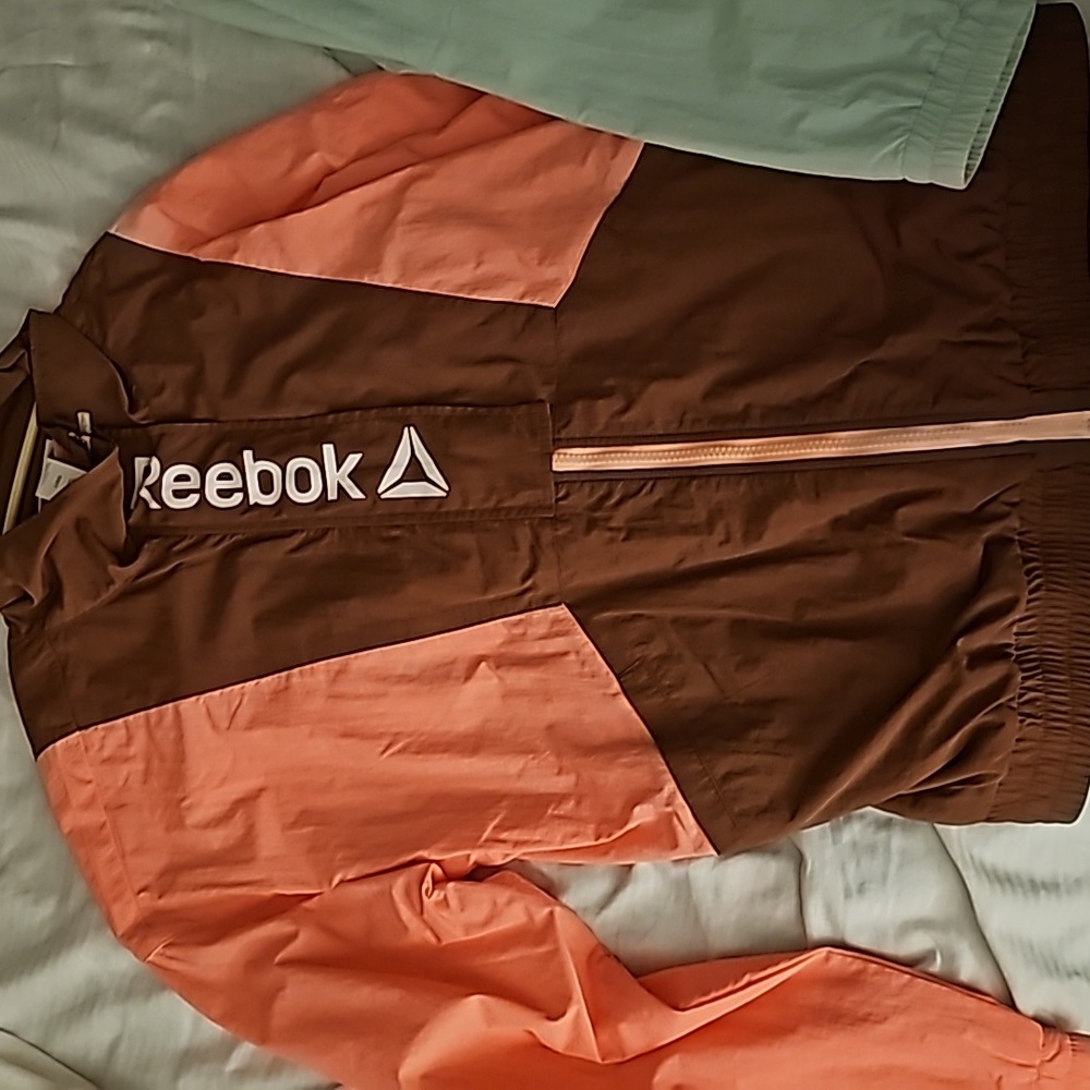 Woman's large Reebok windbreaker suit
